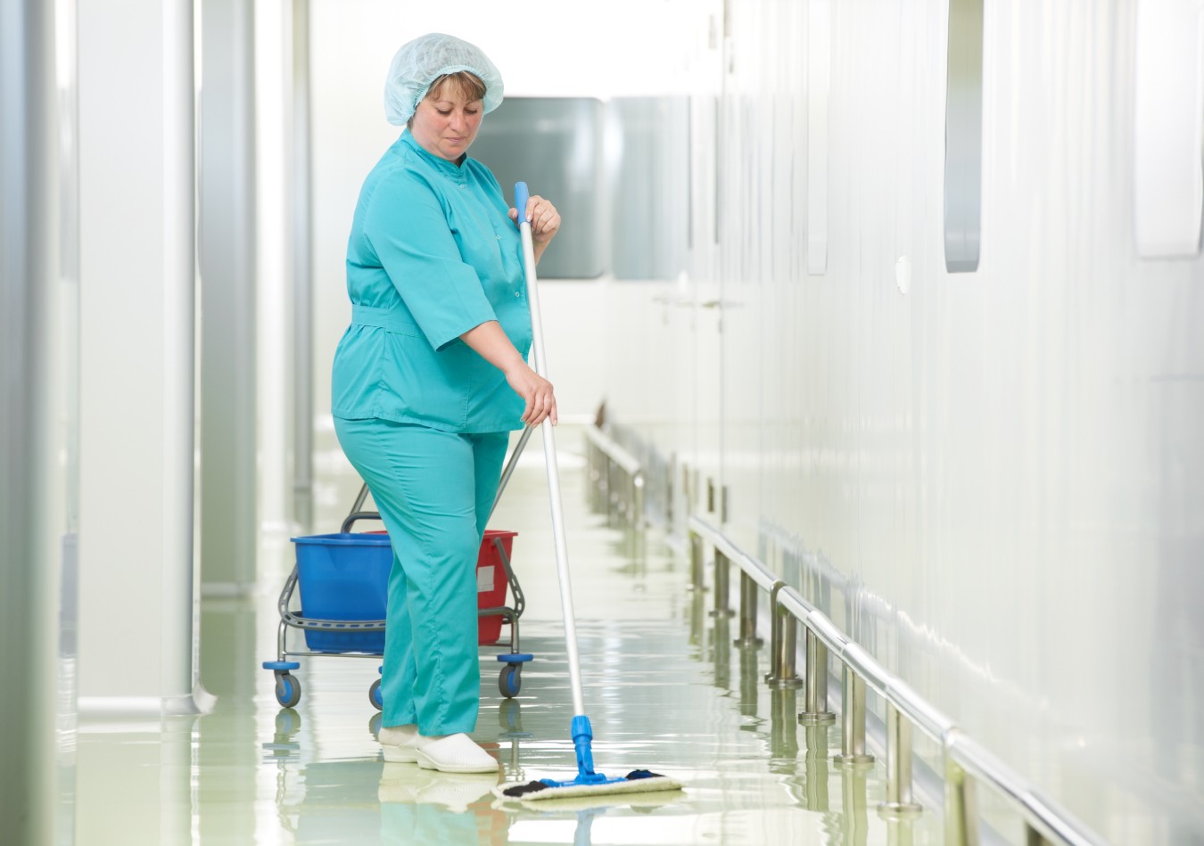 Certificate III in Healthcare Services - Cleaning: Banner: Cleaner mopping floor in pharmaceutical facility